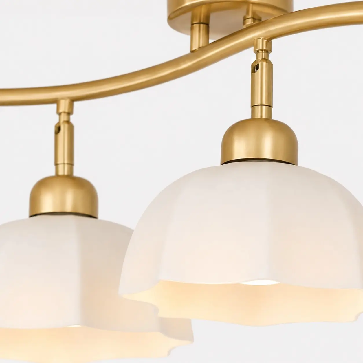 Gold lamp holder and glass shade detail